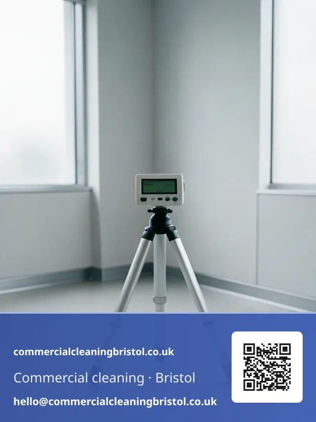 Particle counter on a small tripod positioned in the centre of a freshly cleaned room