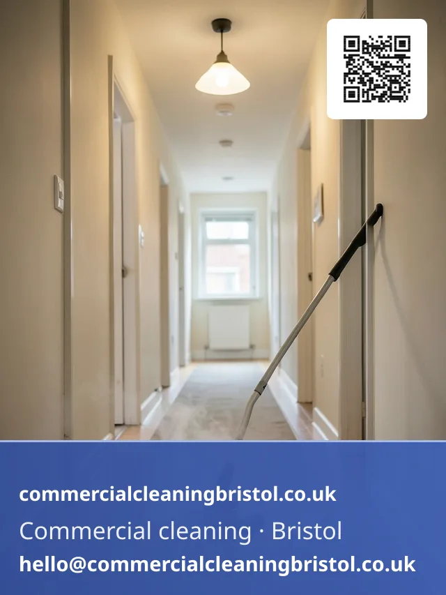 Carpet extraction wand drawn in slow passes across a communal hallway runner shared by several flats