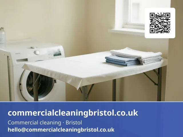 Shared laundry room's folding table wiped down with a microfibre cloth