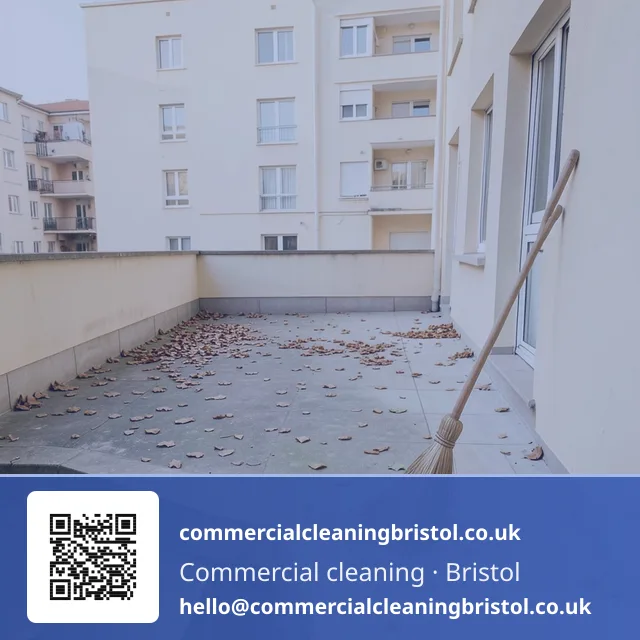 Residential block's rooftop terrace swept clear of leaves and grit ahead of the weekend