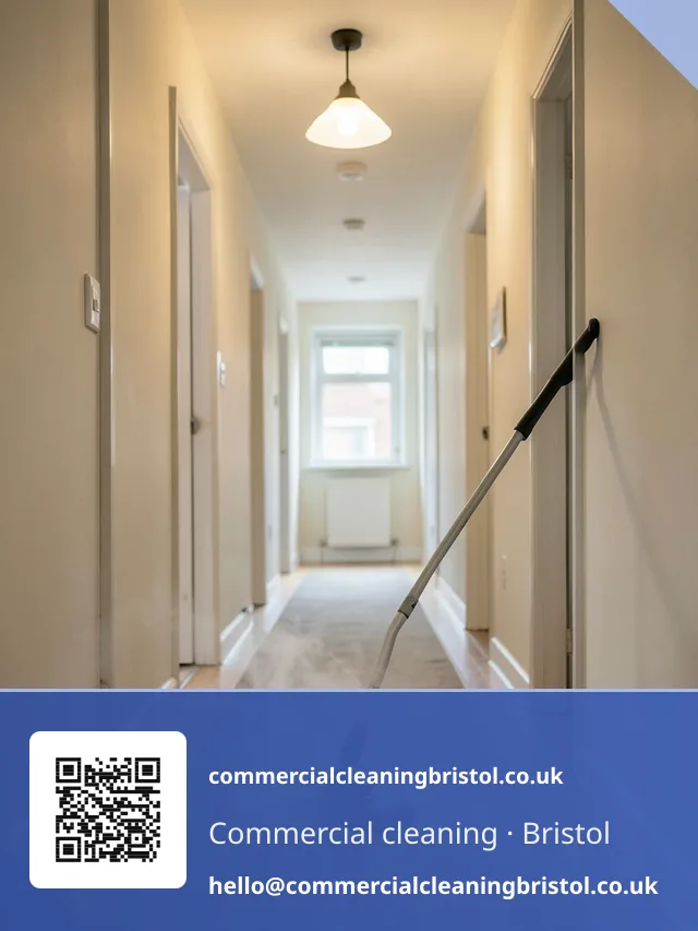 Carpet extraction wand drawn in slow passes across a communal hallway runner shared by several flats