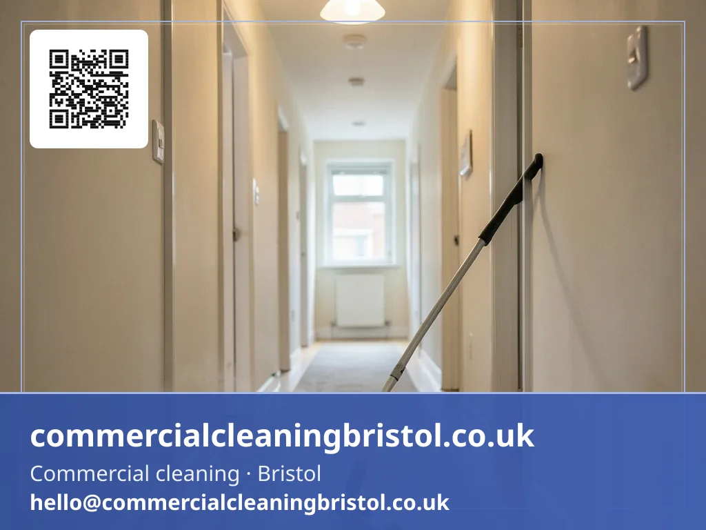Carpet extraction wand drawn in slow passes across a communal hallway runner shared by several flats