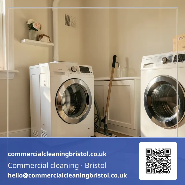 Utility room's floor mopped around a washing machine and dryer